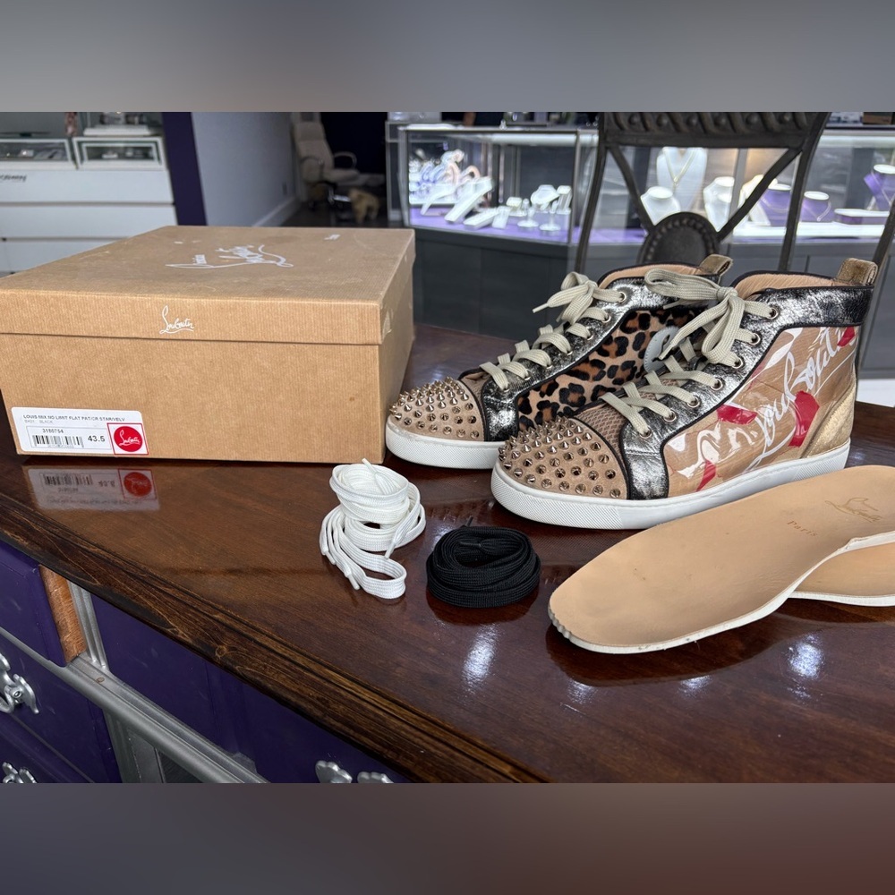 CHRISTIAN LOUBOUTIN “Lou Spikes Kraft” flat high trainers